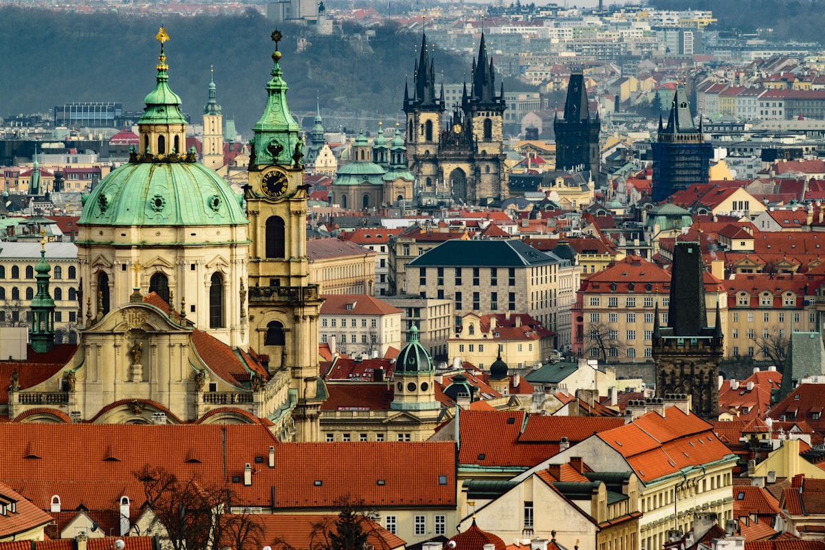 Prague Castle overlooking the city with its Gothic spires and red rooftops